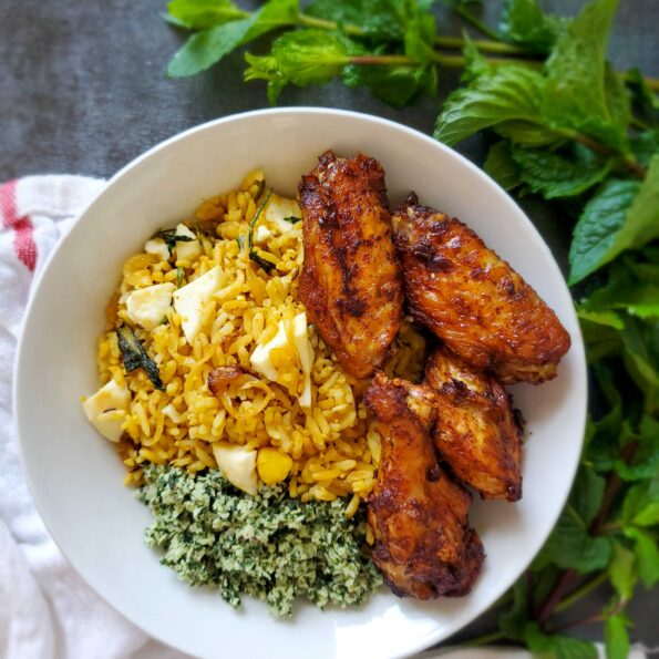 stir-fried egg biriyani with mint sambol and chicken wings